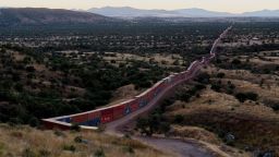 A view of shipping containers from the border wall on the frontier with Mexico in Cochise County, Arizona, U.S. November 6, 2022.  