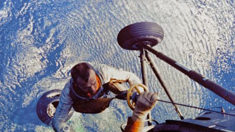 Shepard is lifted up to the helicopter after he splashed down in the Atlantic Ocean aboard the Mercury capsule in May 1961.