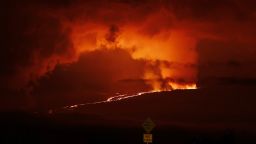 A river of lava flows down from Mauna Loa, Monday, Nov. 28, 2022, near Hilo, Hawaii. Mauna Loa, the world's largest active volcano erupted Monday for the first time in 38 years. 