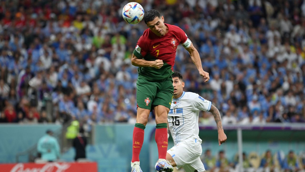 Cristiano Ronaldo attempts to head the ball home against Uruguay.