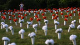 A person observes a memorial honoring 45,000 lives lost due to gun violence in 2020 seen on the National Mall near the Washington Monument in Washington, U.S., June 7, 2022. REUTERS/Leah Millis
