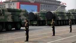 Chinese military vehicles carrying DF-41 ballistic missiles roll past the Great Hall of the People during a parade to commemorate the 70th anniversary of the founding of Communist China in Beijing, Tuesday, October 1, 2019. 