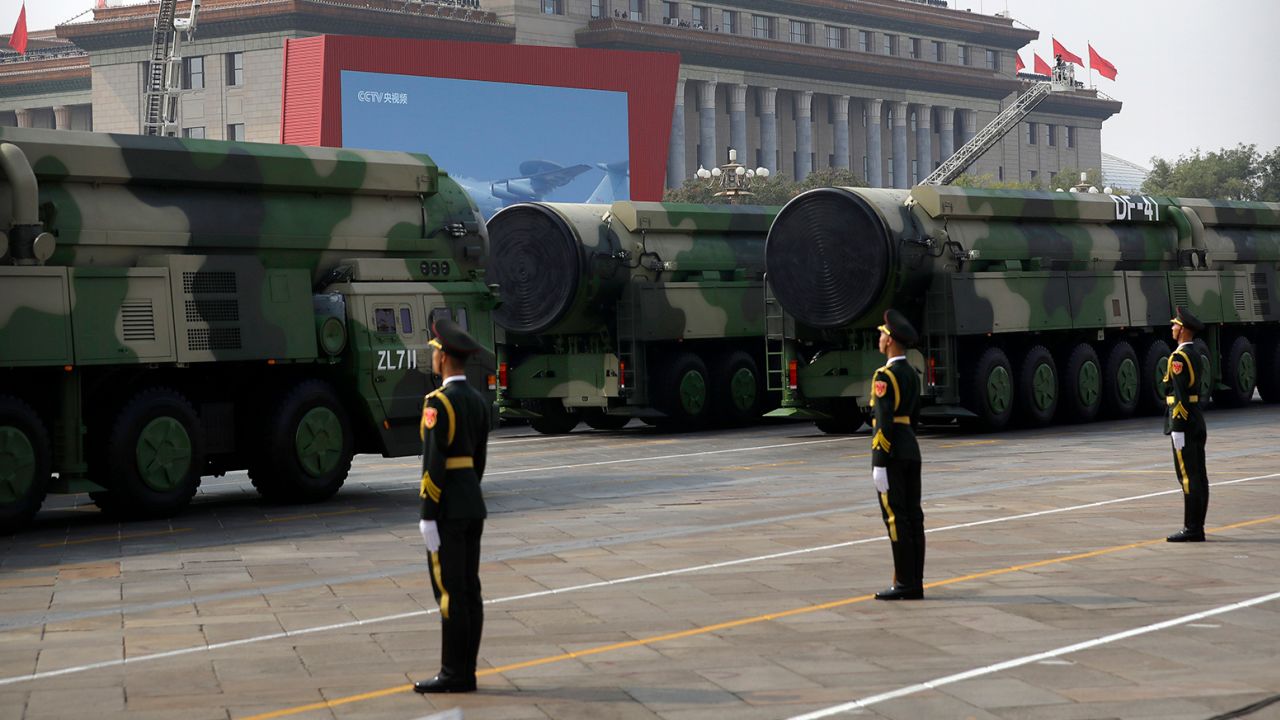 Chinese military vehicles carrying DF-41 ballistic missiles roll past the Great Hall of the People during a parade to commemorate the 70th anniversary of the founding of Communist China in Beijing, October 1, 2019. 