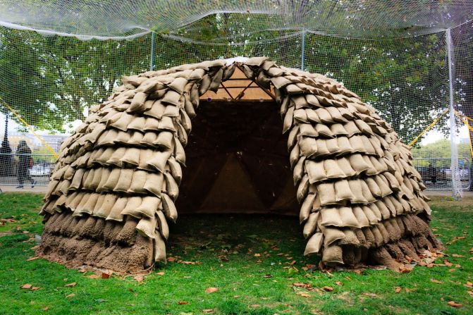 <strong>Mud Shell prototype, London, UK, MuDD Architects (2018) -- </strong>The European architecture firm put on a show at the<a href="index.php?page=&url=https%3A%2F%2Fwww.muddarchitects.com%2Fmudshell" target="_blank" target="_blank"> London Design Festival</a> with a simple, quick-to-build structure with a high-tech twist: it was completed by a drone operating a hose covering it in sprayable clay. The delivery method has the potential to find other uses. Architect Stephanie Chaltiel has trialed drones that can carry 220lbs of biomaterial than could be used to treat hard-to-access facades, potentially replacing the need for scaffolding. 