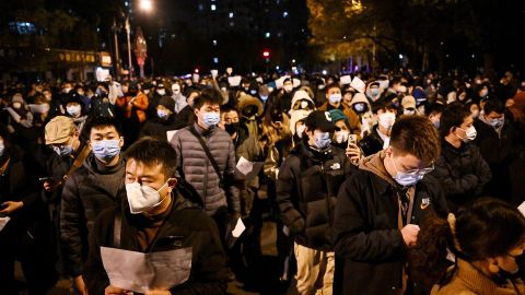 Demonstrators march through the streets of Beijing on November 28, demanding an end to zero Covid-19.