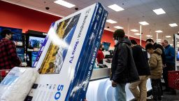 Shoppers in the television section of a Target store on Black Friday in Chicago, Illinois, US, on Friday, Nov. 25, 2022. 