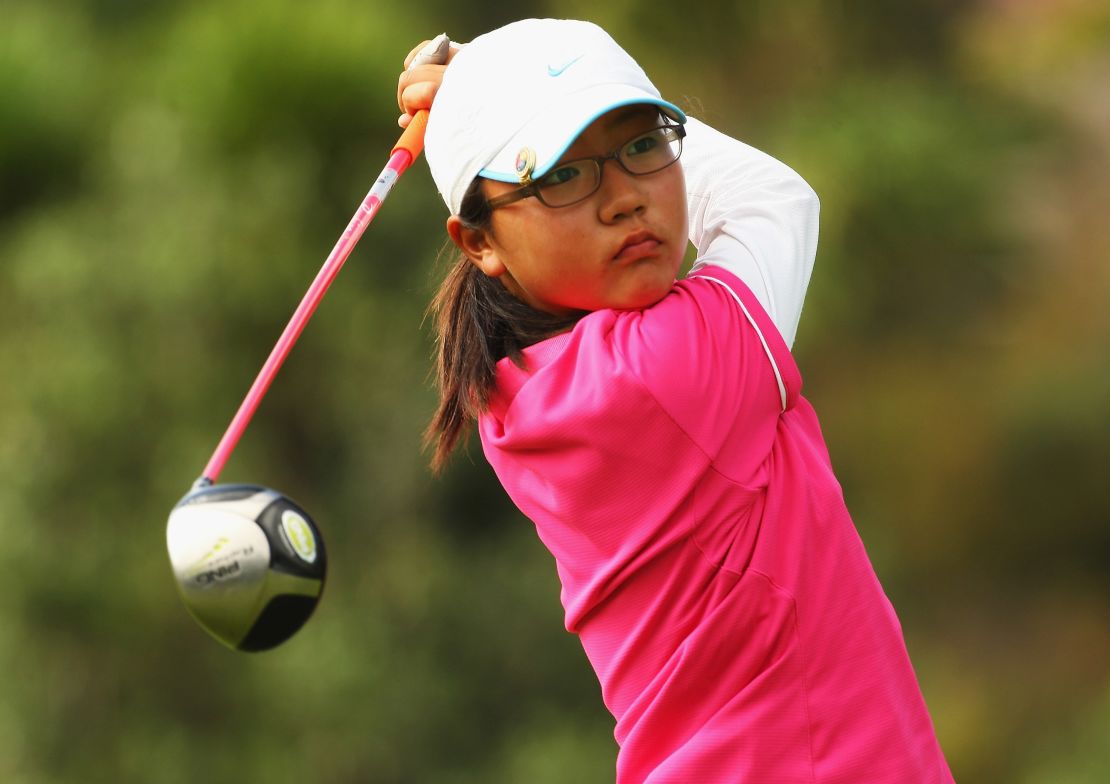 A 12-year-old Ko tees off at the New Zealand Men's & Women's Amateur Championship in April 2009.