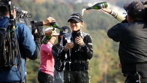 Ko is showered in champagne after winning the BMW Ladies Championship in October.
