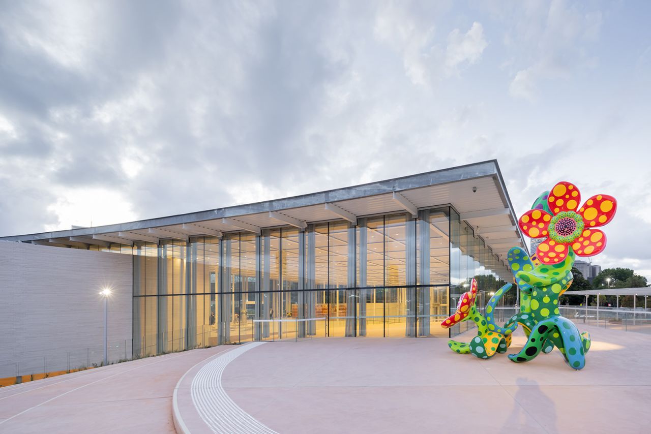 Japanese artist Yayoi Kusama's sculpture "Flowers that Bloom in the Cosmos" seen outside the gallery's new building.
