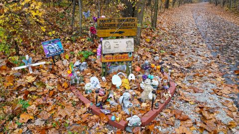 A makeshift memorial to the teen girls near where they were last seen and where the bodies were discovered stands along the Monon Trail leading to the Monon High Bridge Trail in Delphi, Indiana, on October 31, 2022. 