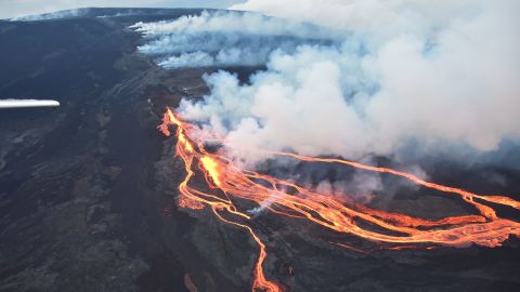 Mauna Loa's eruption sent lava flows cascading down slope, impacting the road used to access the Mauna Loa Observatory and cutting off power to maintain critical climate tool.