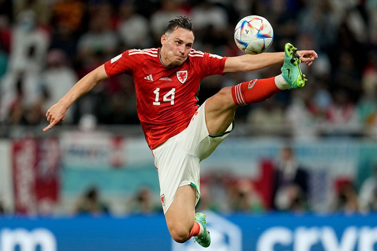 Wales' Connor Roberts stretches for a ball during the match against England.