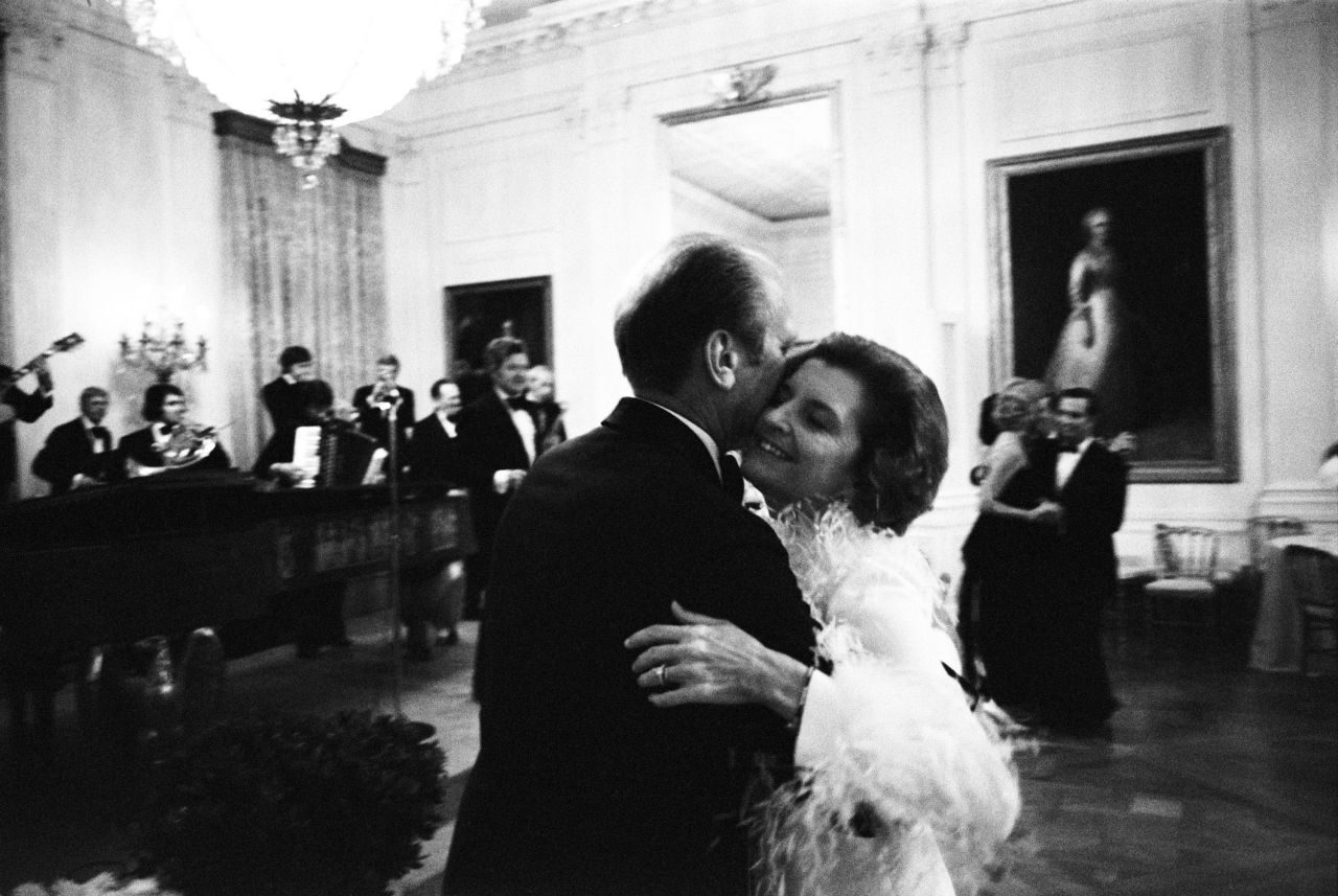 US President Gerald Ford dances with first lady Betty Ford during a state dinner held in honor of Jordan's King Hussein in 1974.