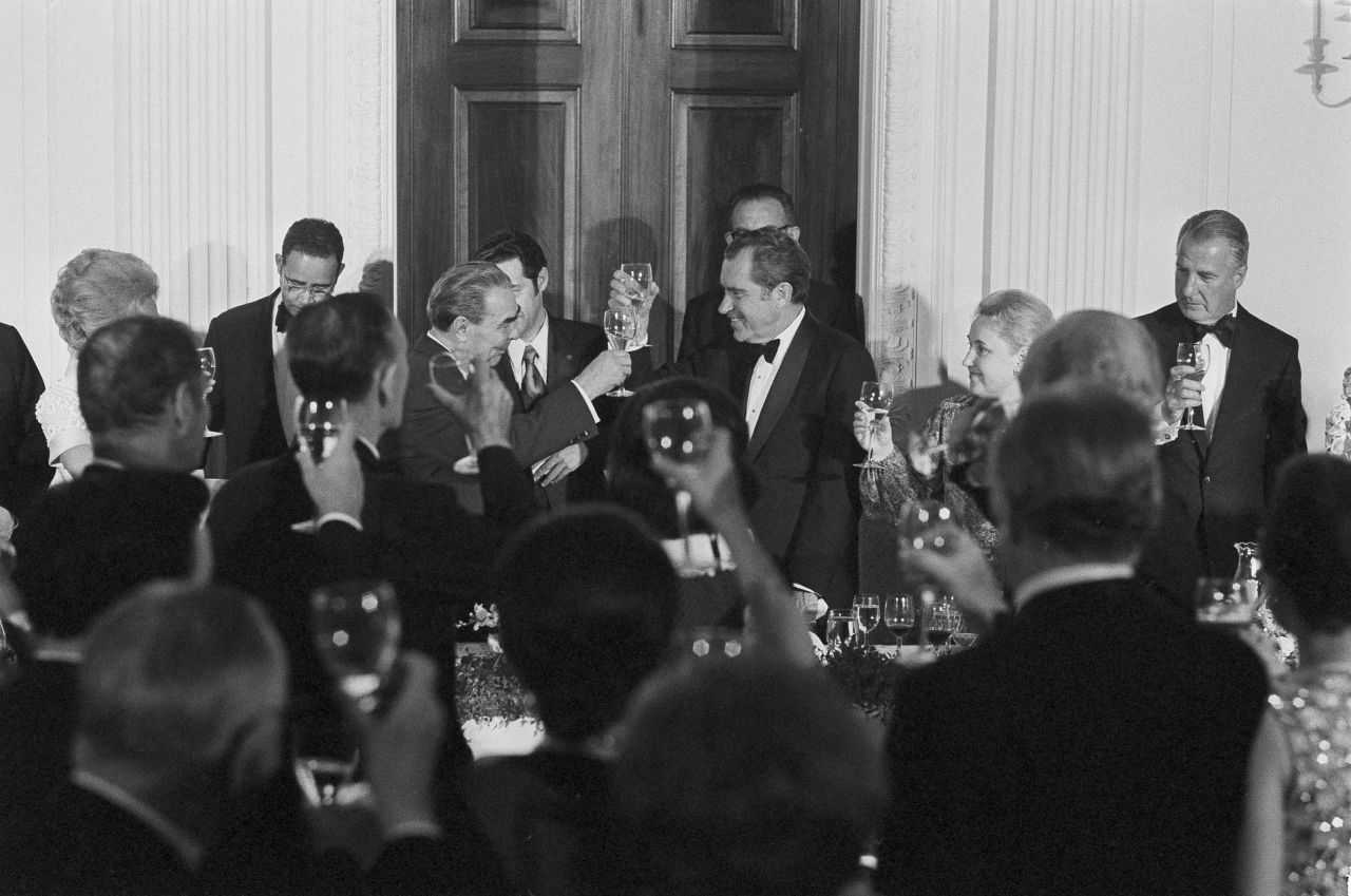 US President Richard Nixon and Soviet leader Leonid Brezhnev share a toast during a state dinner in 1973.