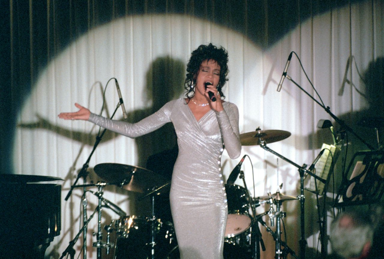 Singer Whitney Houston performs at a state dinner in honor of South African President Nelson Mandela in 1994.