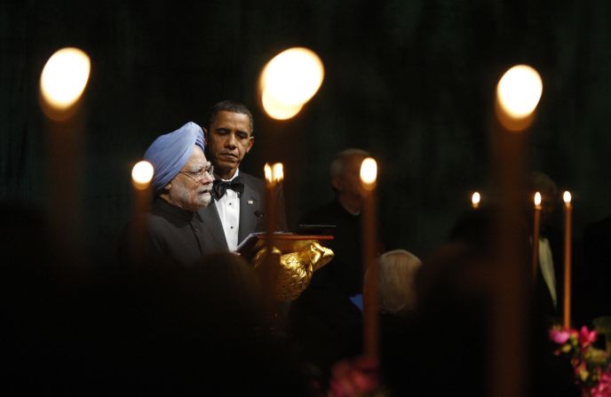 Obama listens to Singh during toasts in 2009.