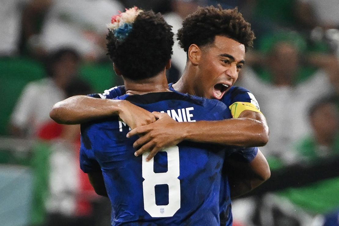 Weston McKennie and Tyler Adams celebrate the opening goal.