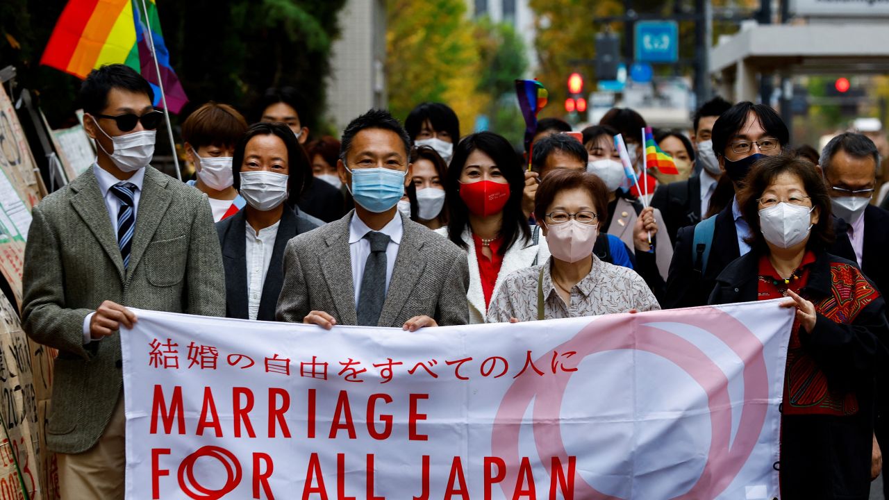 Plaintiffs, lawyers and supporters marched to the court over the ruling on same-sex marriage in Tokyo, Japan, on November 30, 2022.