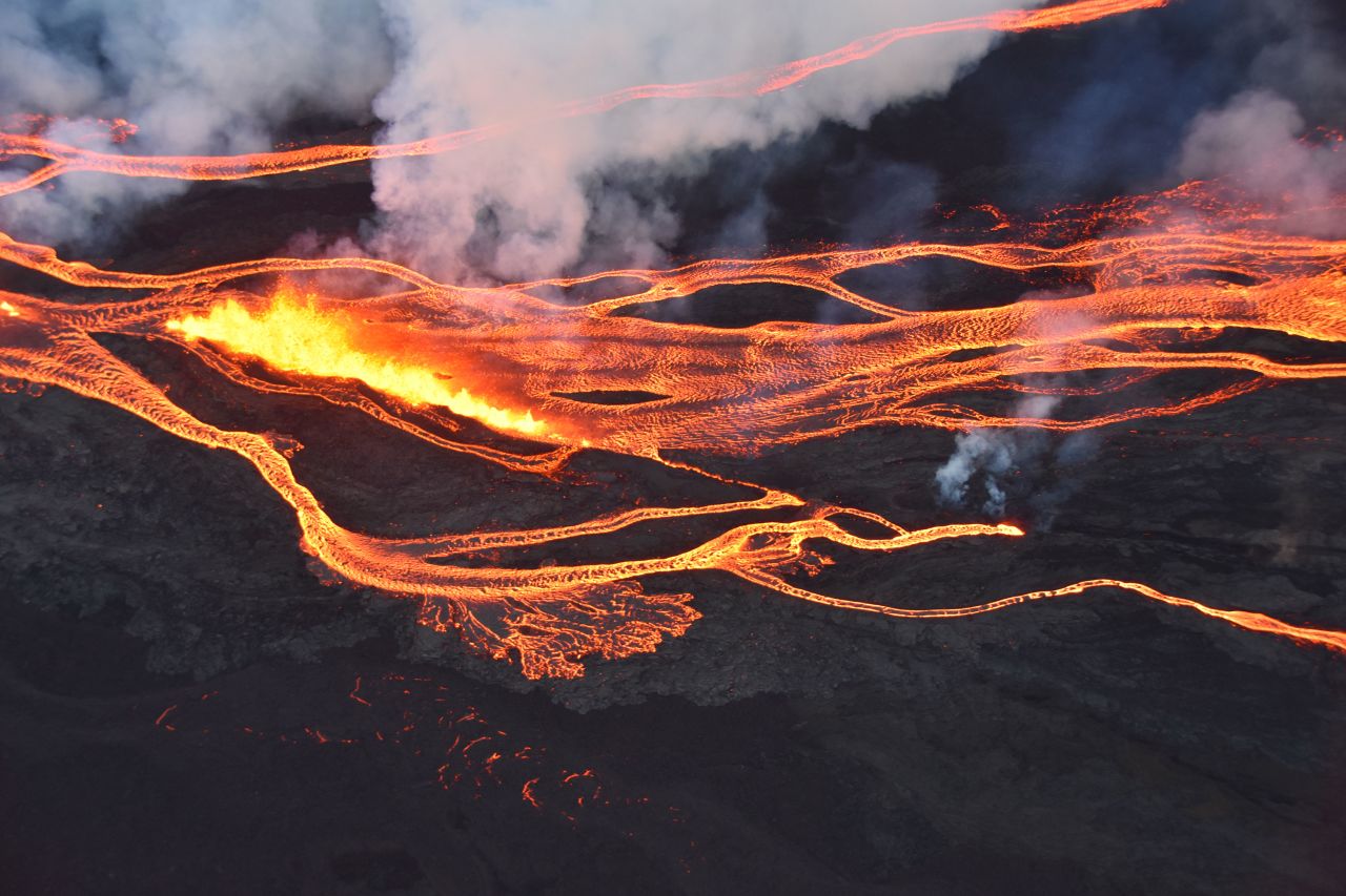 This aerial photo, taken on Monday, November 28, shows a line of fissure vents erupting on Hawaii's Mauna Loa volcano.
