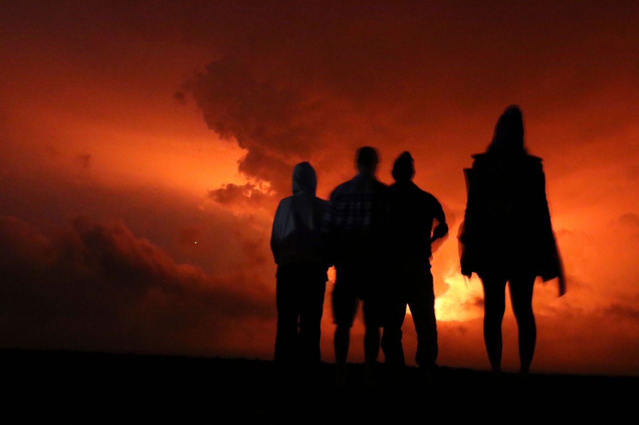 People watch the lava on November 28.