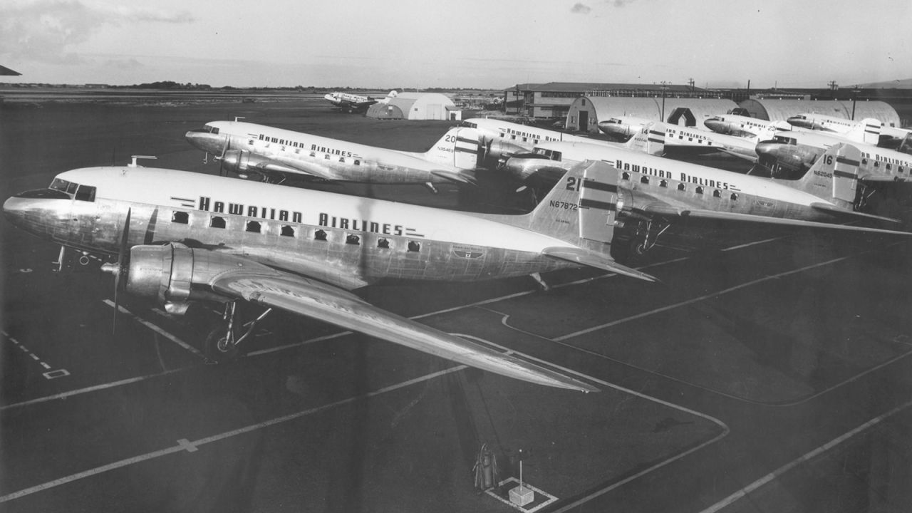 Douglas DC-3 aircraft pictured at John Rodgers Airport, now Daniel K. Inouye International Airport, in Honolulu. This photo is from 1947, the year Bruhn started working at Hawaiian Airlines.
