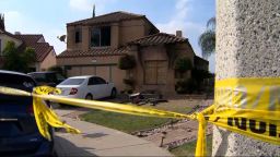 The crime scene is taped off in Riverside, California, on November 28.