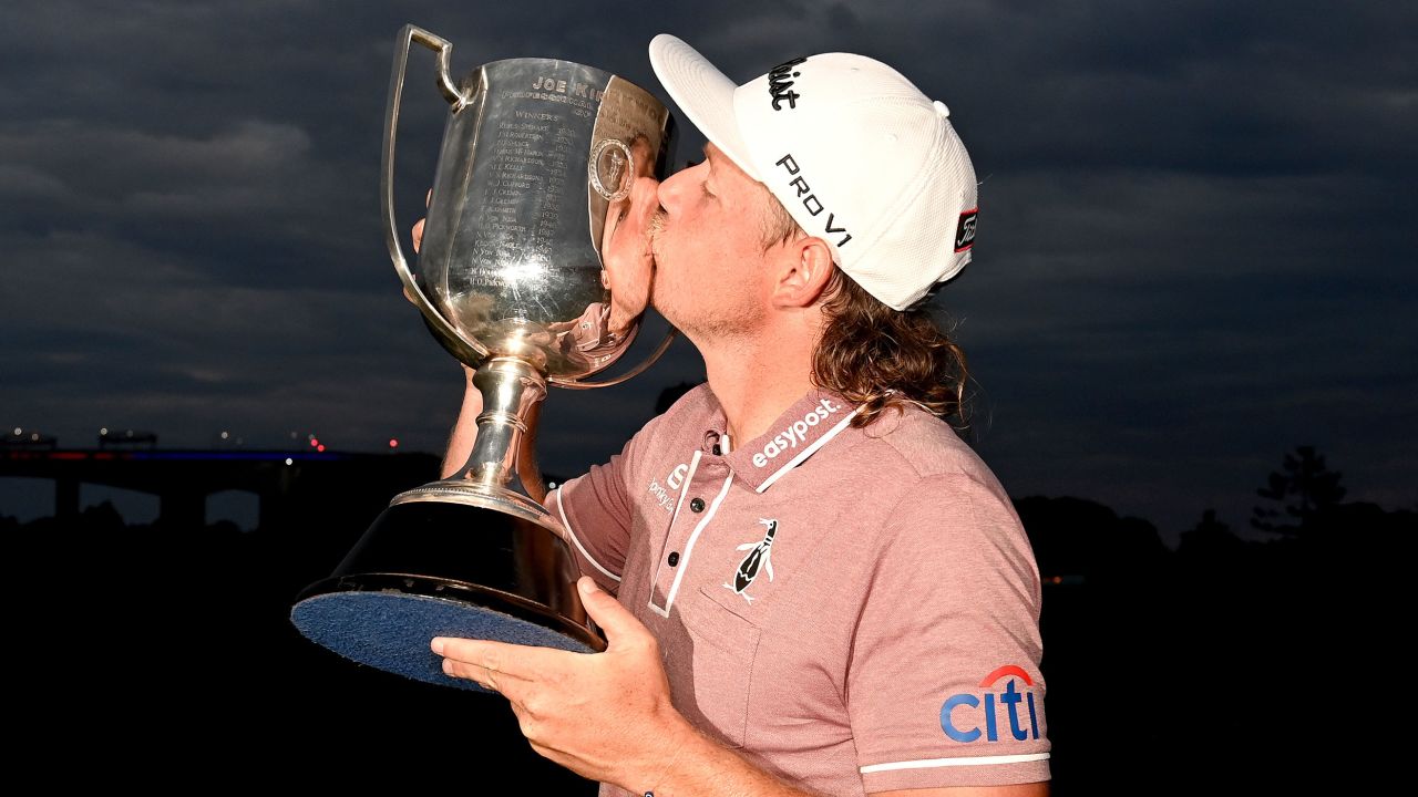 Smith kisses the Kirkwood Cup after his win.