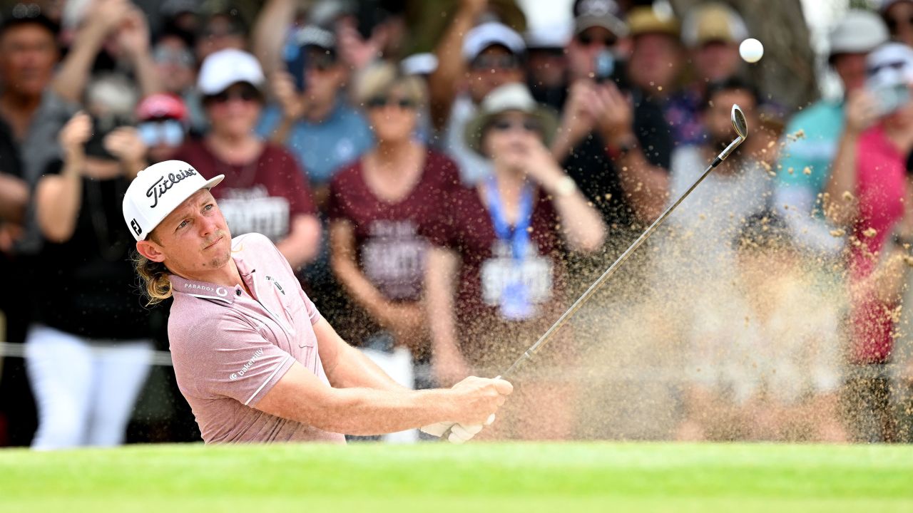 Smith plays a shot from the bunker during the final round.