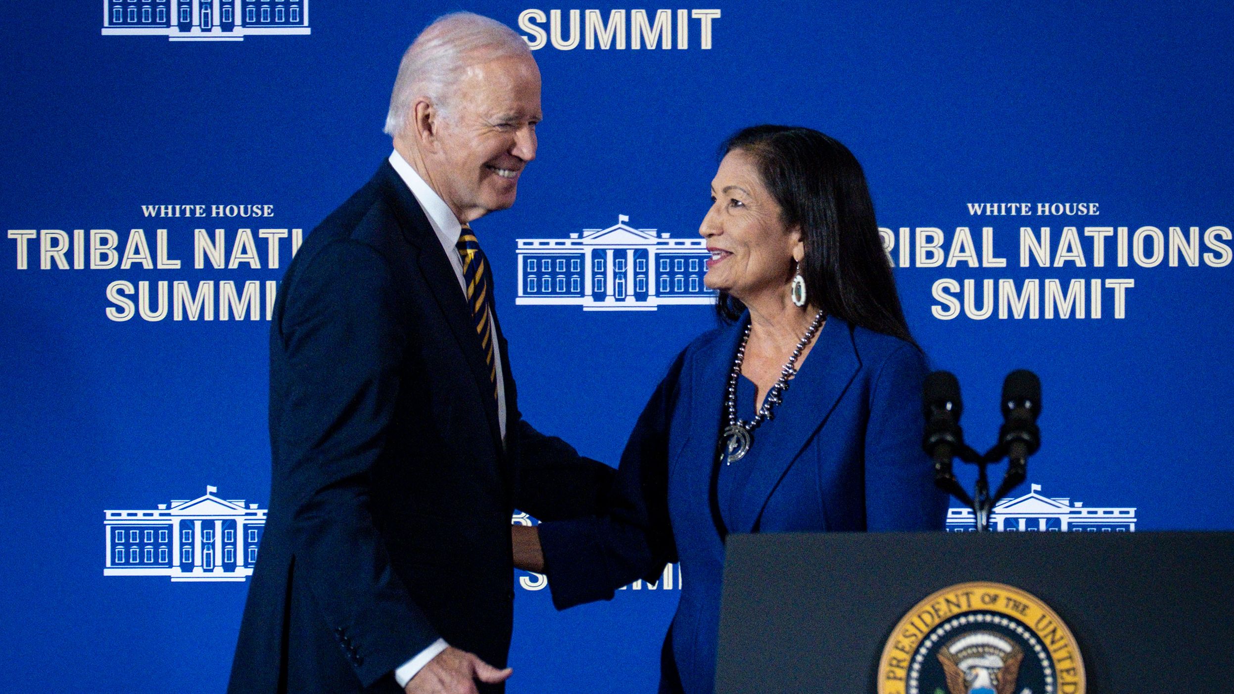 President Joe Biden greets Department of the Interior Secretary Deb Haaland during the 2022 White House Tribal Nations Summit at the Department of the Interior on November 30, 2022 in Washington, DC.