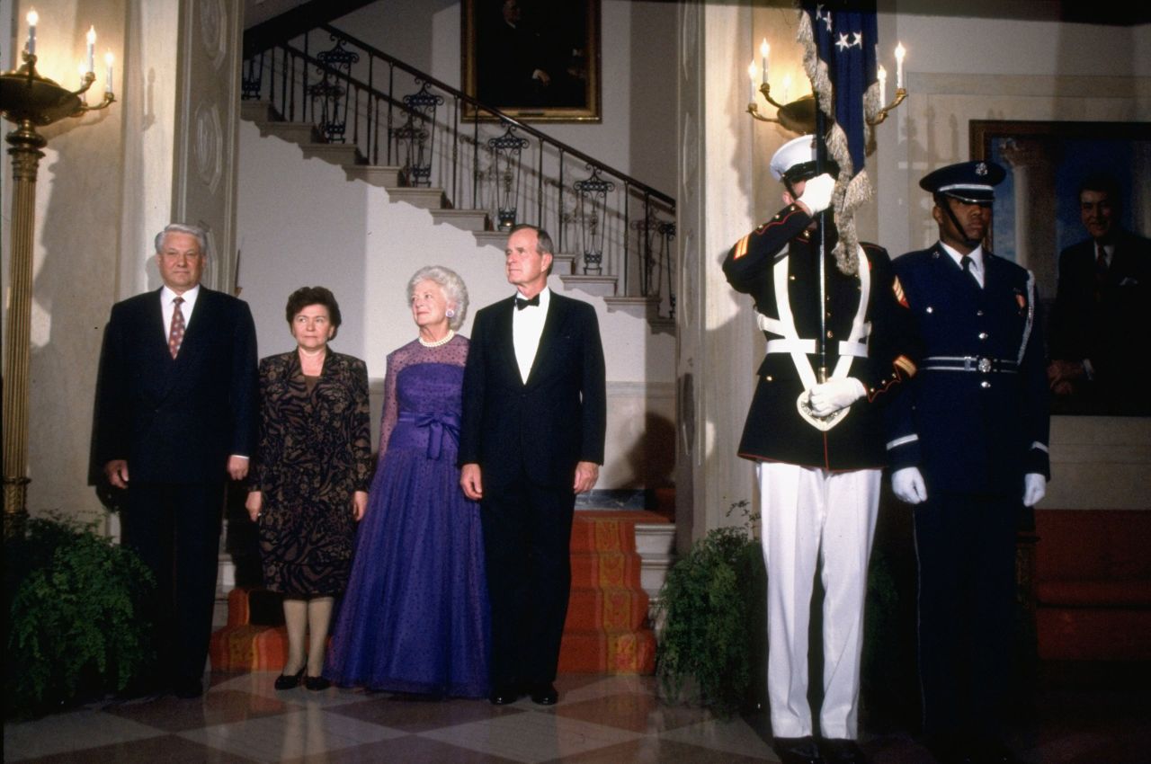 Russian President Boris Yeltsin and his wife, Naina, stand next to US President George H.W. Bush, right, and his wife, Barbara, before a state dinner in 1992. Following the Cold War, state dinners began to taper off.