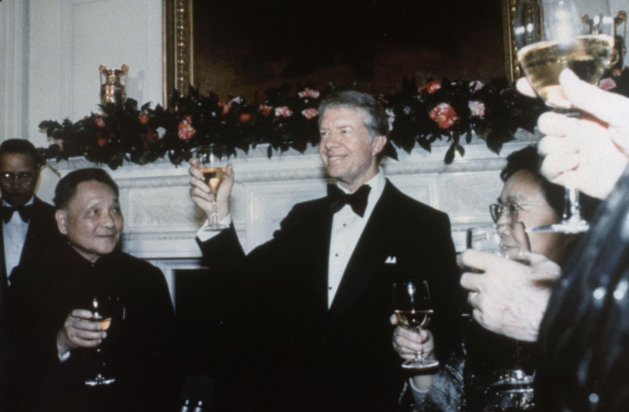 US President Jimmy Carter offers a toast while hosting Chinese Vice Premier Deng Xiaoping and his wife, Cho Lin, at a state dinner in 1979. There was no hard liquor served at state dinners hosted by Carter, but they did serve beer and wine.
