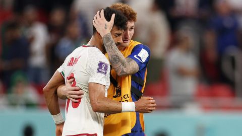 Josh Sargent and Ramin Rezaeian embrace after Tuesday's game.