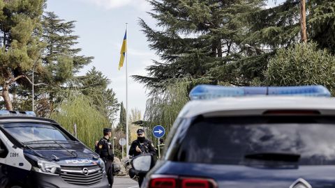 Police guard the Ukrainian embassy in Madrid after a letter bomb exploded there Wednesday.