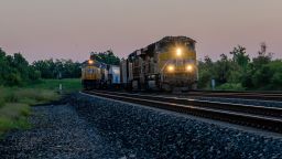 Freight trains travel through Houston on September 14, 2022 in Houston, Texas. Rail carriers across the country are cutting shipments and Amtrak has begun stopping passenger routes as a national railroad strike looms. 