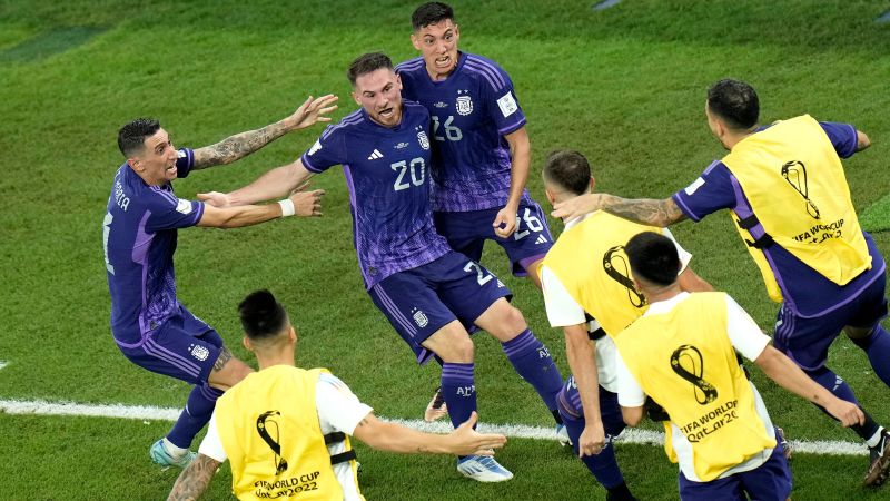 Lionel Messi has penalty saved but Argentina progresses to World Cup knockout stages with win | CNN