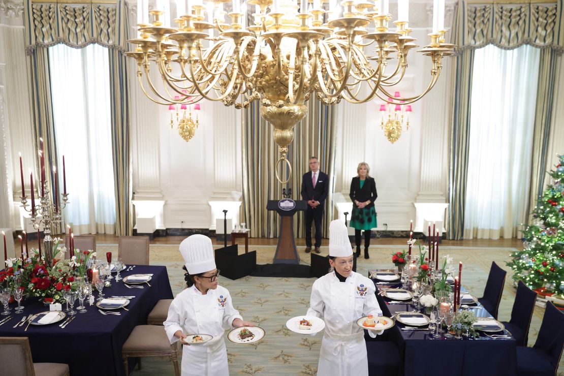 First Lady Jill Biden and White House staff present the menu during a media preview ahead of the state dinner in honor of French President Emmanuel Macron, in the State Dining Room of the White House.