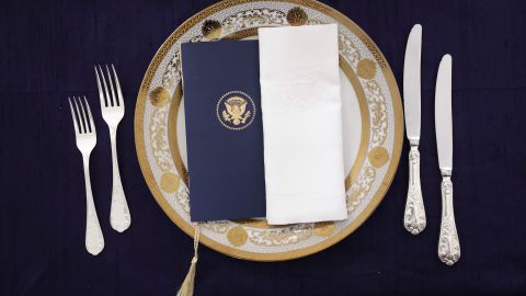 A table is set during a media preview ahead of the State Dinner in honor of French President Emmanuel Macron, in the State Dining Room of the White House in Washington, DC, on November 30, 2022. 