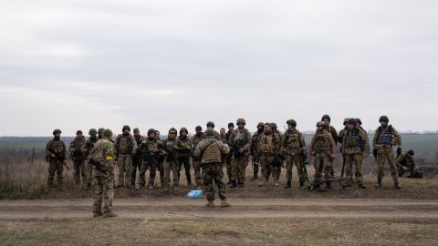 Ukrainian soldiers after military training simulating an attack in the trenches for the counteroffensive to recapture Kherson.