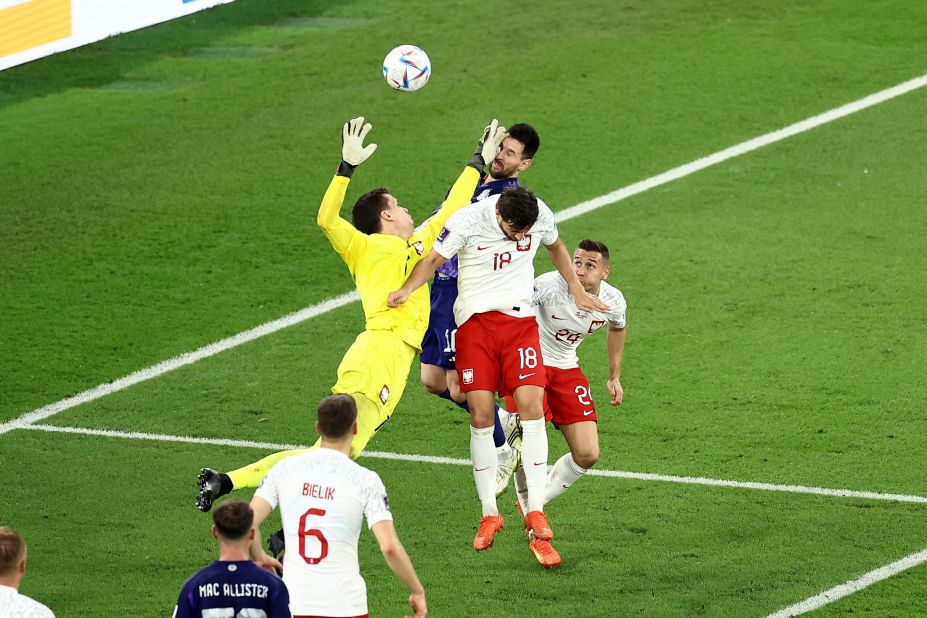 Argentina star Lionel Messi is hit in the face by Poland's Wojciech Szczesny in the first half November 30. A penalty was given after video review, but Szczesny saved Messi's shot.