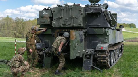 Ukrainian artillerymen load an M109 self-propelled howitzer, during training at Grafenwoehr Training Area, May 12, 2022. 