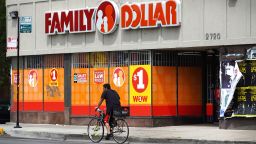 A cyclist rides past a Family Dollar store in the Humboldt Park neighborhood on August 02, 2022 in Chicago, Illinois. Discount stores have seen a double digit increase in business as higher income shoppers look to the stores for a hedge against inflation that continues to chip away at their buying power.  