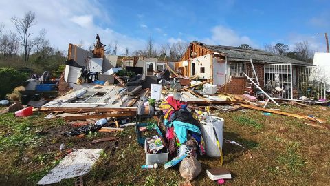 Joe Mays, his wife Ashley and their three sons took shelter in a small hallway Tuesday night when a storm severely damaged their home in Tallassee, Alabama.