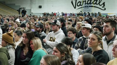 People attending a vigil Nov. 30 for the four University of Idaho students stand in the Kibbie Dome as family members talk about loved ones in Moscow, Idaho.
