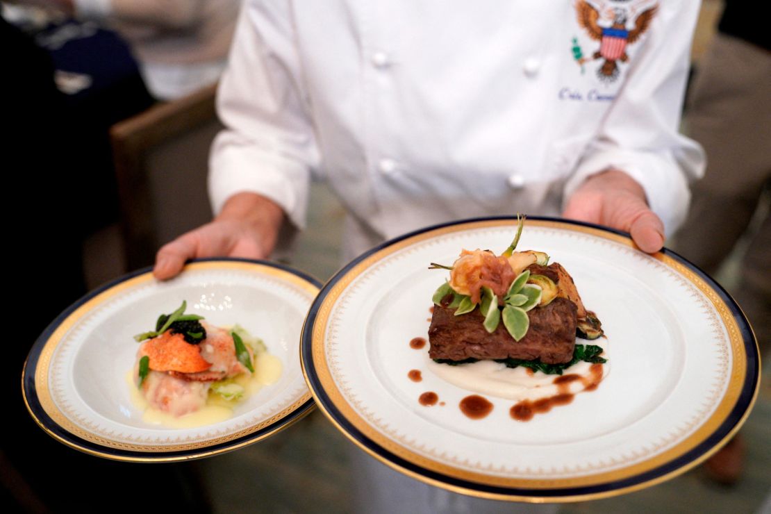 Butter-poached Maine lobster and calotte of beef, shallot marmalade, are seen at the White House during a media preview of the state dinner for French President Emmanuel Macron.