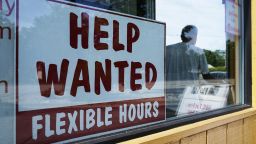 Help wanted sign is displayed in Deerfield, Ill., Wednesday, Sept. 21, 2022.