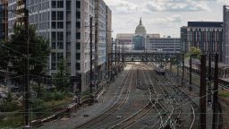 The U.S. Capitol is seen beyond commuter and freight railway tracks in Washington, D.C. on September 14, 2022 as a potential nationwide labor strike looms. 