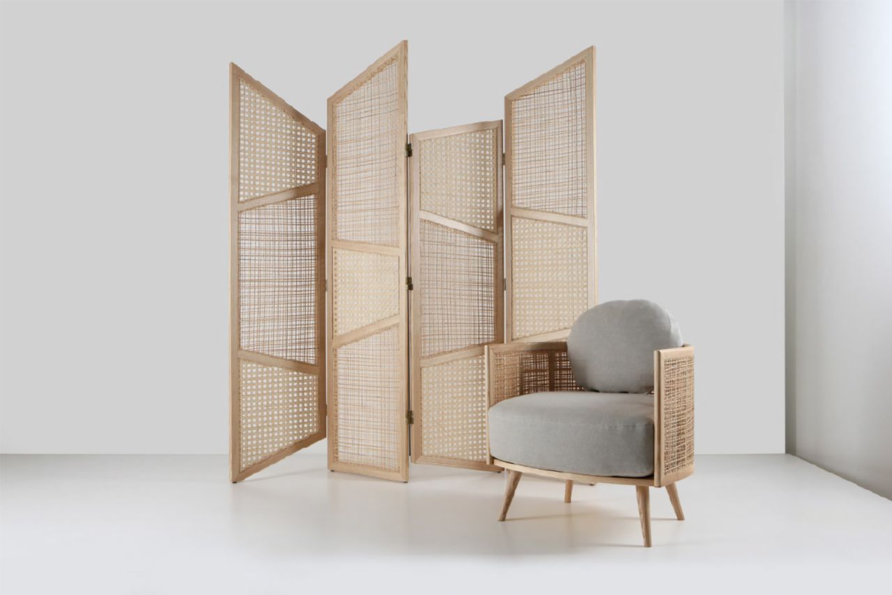 Designer Nada Debs creates furniture with natural materials like straw and hardwood.
