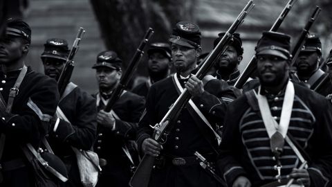 Will Smith (center) in a scene from "Emancipation."