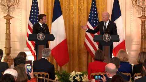 US President Joe Biden and French President Emmanuel Macron are seen taking part in a joint news conference at the White House on Thursday.
