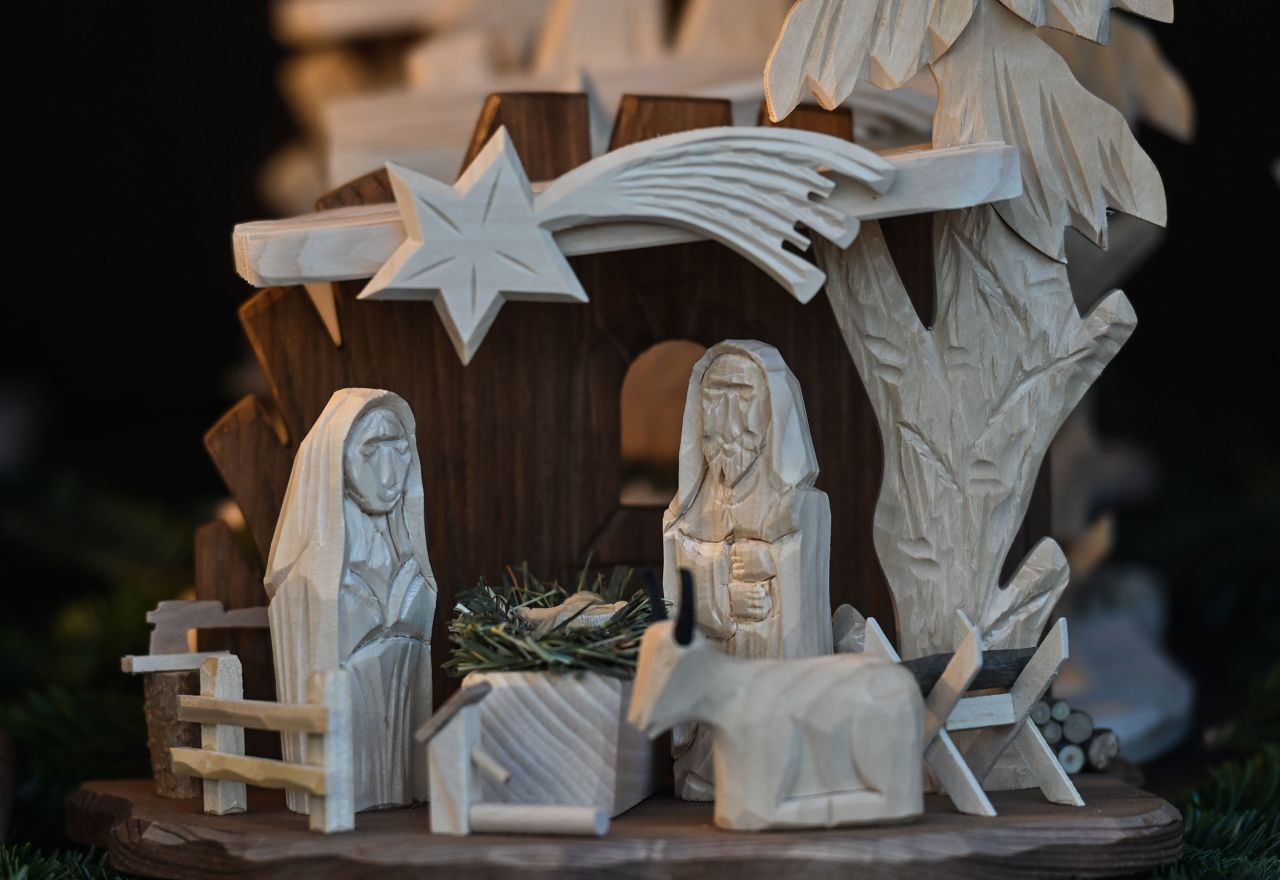 View of a wooden Nativity Scene on display at the Christmas Market on the Main Market Square in Krakow, Poland.